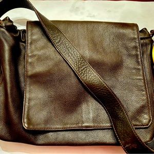 Italian leather shoulder bag . Vintage leather with drawstring, brass accents